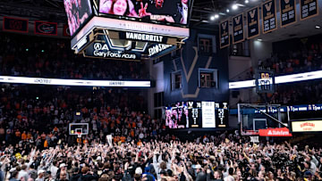 Vanderbilt fans storm the court to celebrate their Commodores win over the Tennessee Volunteers after their game at Memorial Gym in Nashville, Tenn., Saturday, Jan. 18, 2025.