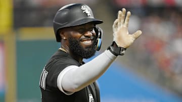 Chicago White Sox second baseman Josh Harrison (5) waves to fans after advancing to third base during the fifth inning against the Cleveland Guardians at Progressive Field in Cleveland on Aug 19, 2022.