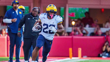 Sep 20, 2025; Lincoln, Nebraska, USA; Michigan Wolverines running back Jordan Marshall (23) runs against the Nebraska Cornhuskers during the fourth quarter at Memorial Stadium. Mandatory Credit: Dylan Widger-Imagn Images