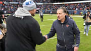 Matt Eberflus is congratulated by Dan Campbell after the Bears win at Soldier Field. According to reports, the Bears will host the Lions in Week 16 this year but will be at Detroit on Thanksgiving.