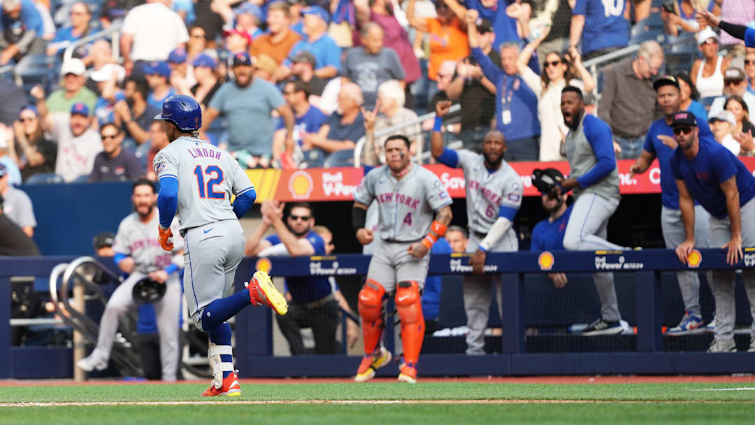 Sep 11, 2024; Toronto, Ontario, CAN; New York Mets shortstop Francisco Lindor (12) runs the bases after hitting a home run against the Toronto Blue Jays during the ninth inning at Rogers Centre. Mandatory Credit: Nick Turchiaro-Imagn Images