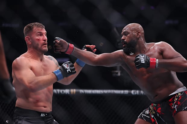 Jon Jones (red gloves) fights Stipe Miocoic (blue gloves) in the  heavyweight bout during UFC 309 at Madison Square Garden. 