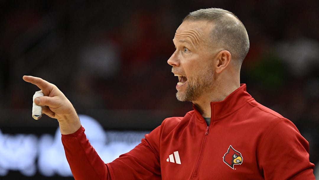 Nov 24, 2025; Louisville, Kentucky, USA; Louisville Cardinals head coach Pat Kelsey reacts during the second half against the Eastern Michigan Eagles at KFC Yum! Center. Louisville defeated Eastern Michigan 87-46. Mandatory Credit: Jamie Rhodes-Imagn Images Nov 24, 2025; Louisville, Kentucky, USA; Louisville Cardinals head coach Pat Kelsey reacts during the second half against the Eastern Michigan Eagles at KFC Yum! Center. Louisville defeated Eastern Michigan 87-46. Mandatory Credit: Jamie Rhodes-Imagn Images
