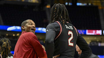 Mar 12, 2025; Nashville, TN, USA; South Carolina Gamecocks head coach Lamont Paris talks with guard Zachary Davis (2) during a time out against the Arkansas Razorbacks during the first half at Bridgestone Arena. Mandatory Credit: Steve Roberts-Imagn Images