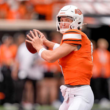 Oklahoma State quarterback Zane Flores (6) warms up before an NCAA football game between Oklahoma State (OSU) and UT Martin in Stillwater, Okla., on Thursday, Aug. 28, 2025.