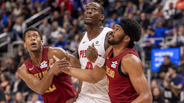 Oct 27, 2025; Detroit, Michigan, USA; Detroit Pistons center Jalen Duren battles for position with Cleveland Cavaliers forward De'Andre Hunter (12) and center Jarrett Allen (31) during the first half at Little Caesars Arena. Mandatory Credit: David Reginek-Imagn Images