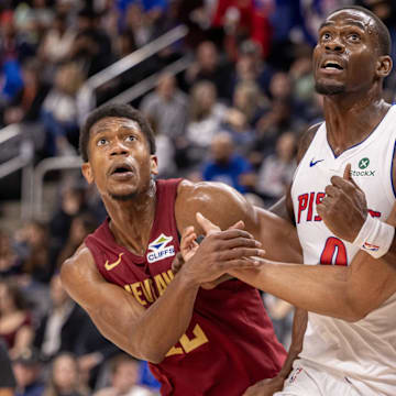 Oct 27, 2025; Detroit, Michigan, USA; Detroit Pistons center Jalen Duren battles for position with Cleveland Cavaliers forward De'Andre Hunter (12) and center Jarrett Allen (31) during the first half at Little Caesars Arena. Mandatory Credit: David Reginek-Imagn Images