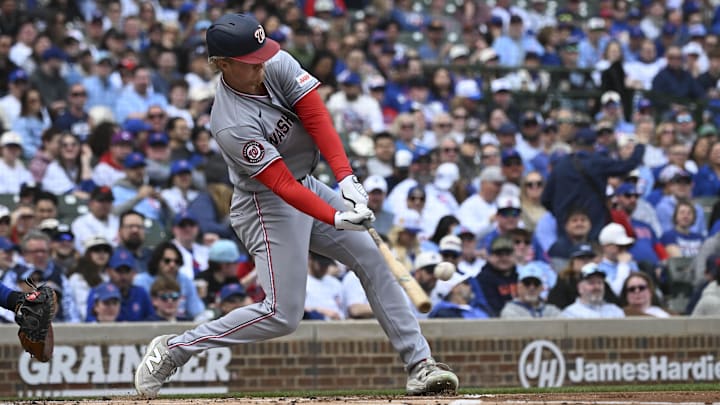 Mar 29, 2026; Chicago, Illinois, USA;  Washington Nationals left fielder Joey Wiemer (21) hits a three-run home run during the first inning against the Chicago Cubs at Wrigley Field. Mandatory Credit: Matt Marton-Imagn Images