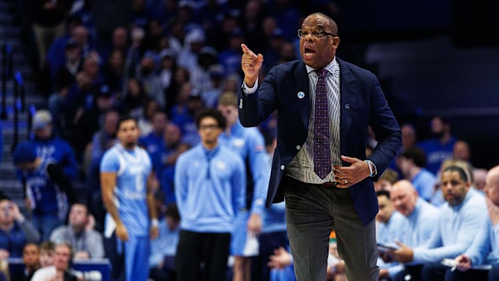 Dec 2, 2025; Lexington, Kentucky, USA; North Carolina Tar Heels head coach Hubert Davis calls out a play during the first half against the Kentucky Wildcats at Rupp Arena at Central Bank Center. Mandatory Credit: Jordan Prather-Imagn Images