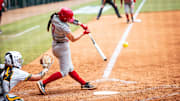 Nebraska shortstop Ava Kuszak launches a grand slam home run against Southeastern Louisiana in the Baton Rouge Regional.
