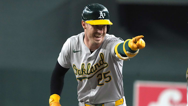 Jun 29, 2024; Phoenix, Arizona, USA; Oakland Athletics outfielder Brent Rooker (25) reacts after hitting a single against the Arizona Diamondbacks in the first inning at Chase Field. Mandatory Credit: Rick Scuteri-USA TODAY Sports