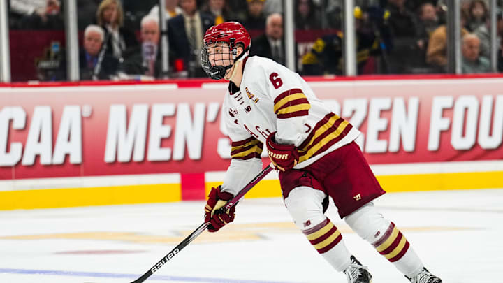 Apr 11, 2024; Saint Paul, Minnesota, USA; Boston College Eagles forward Will Smith (6) carries the puck in the semifinals of the 2024 Frozen Four college ice hockey tournament during the second period against the Michigan Wolverines at Xcel Energy Center. Mandatory Credit: Brace Hemmelgarn-Imagn Images