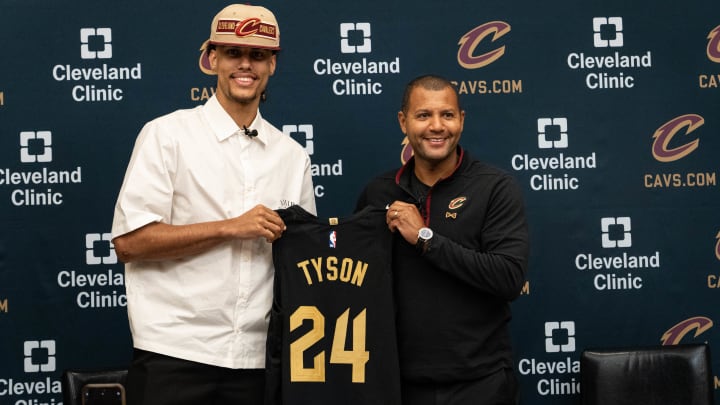 Cavaliers first-round pick Jaylon Tyson posses with team president Koby Altman at his introductory press conference