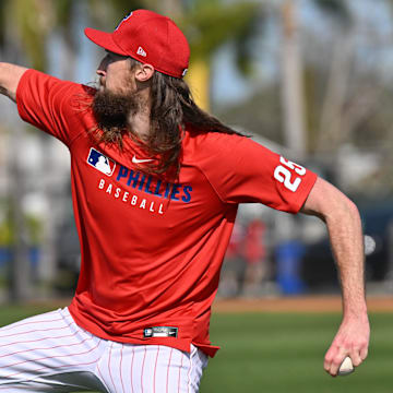 Feb 12, 2025; Clearwater, FL, USA;  Philadelphia Phillies pitcher Matt Strahm (25) warms up during a spring training workout at Carpenter Complex.