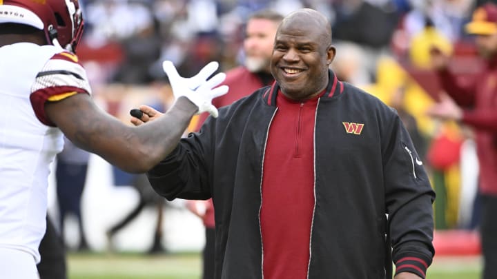 Jan 7, 2024; Landover, Maryland, USA; Washington Commanders offensive coordinator Eric Bieniemy on the field before the game against the Dallas Cowboys at FedExField. Mandatory Credit: Brad Mills-USA TODAY Sports