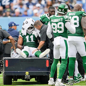 Sep 15, 2024; Nashville, Tennessee, USA;  New York Jets linebacker Jermaine Johnson (11) is carted off against the Tennessee Titans during the second half at Nissan Stadium. 