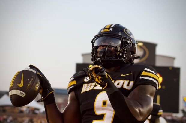 Missouri Tigers running back Marcus Carroll (9) celebrates after scoring against the Murray State Racers at Faurot Field.