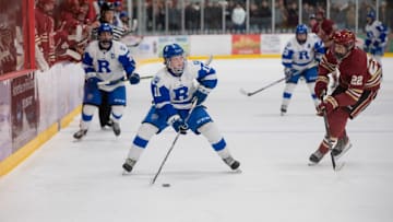 Rogers' Parker Deschene on the puck as a sophomore for the Royals. He's now a senior and headed to the 2025 state tournament.