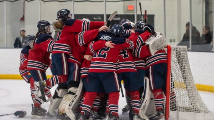 Orono girls hockey celebrates a playoff win