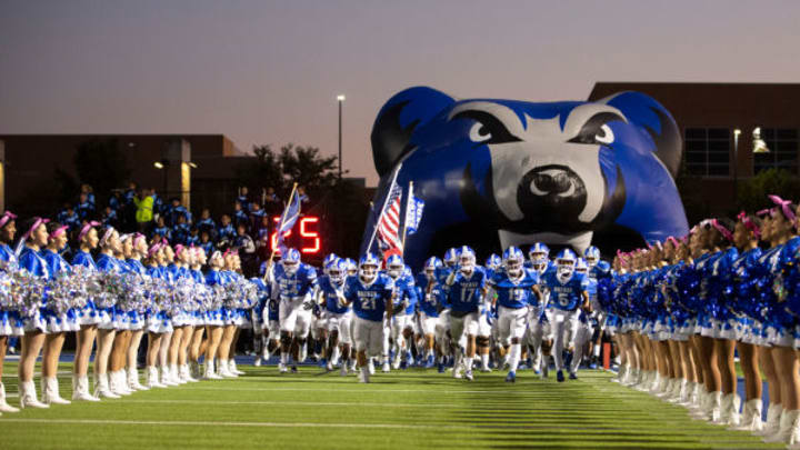 Brewer runs on to the field in a game against Justin.