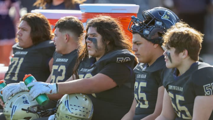 Birmingham Charter football linemen sit on the bench during their CIF State final in December of 2023 against Acalanes. Birmingham Charter football linemen sit on the bench during their CIF State final in December of 2023 against Acalanes.