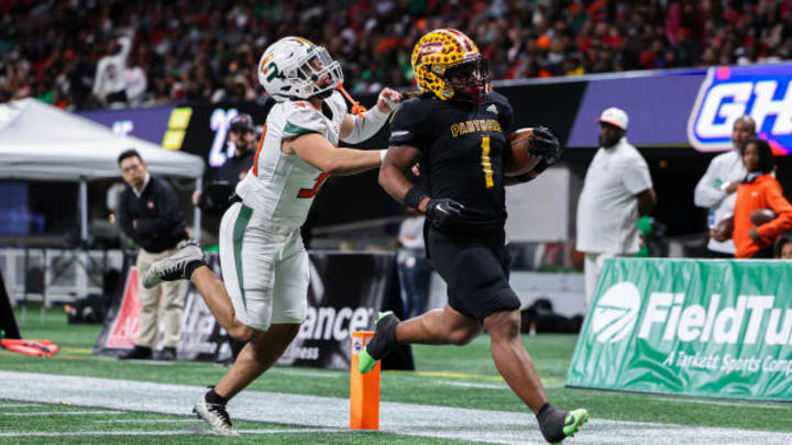 Perry's Ahmad Gordon races into the end zone for a touchdown against Stockbridge in the Georgia 4A state championship game. 