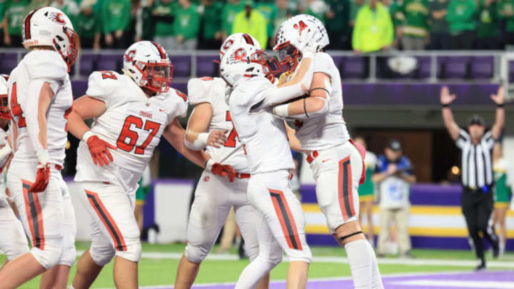 Centennial celebrates a touchdown in the 2023 Prep Bowl win over Edina