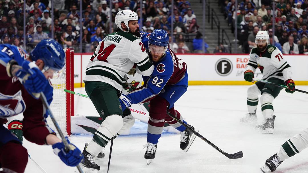 May 3, 2026; Denver, Colorado, USA; Minnesota Wild defenseman Zach Bogosian (24) collides into Colorado Avalanche left wing Gabriel Landeskog (92) during the second period in game one of the second round of the 2026 Stanley Cup Playoffs at Ball Arena. Mandatory Credit: Ron Chenoy-Imagn Images