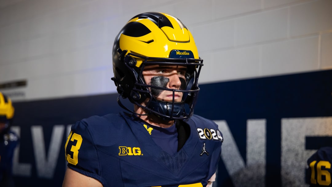 Jan 8, 2024; Houston, TX, USA; Michigan Wolverines quarterback Jack Tuttle (13) against the Washington Huskies during the 2024 College Football Playoff national championship game at NRG Stadium. Mandatory Credit: Mark J. Rebilas-USA TODAY Sports