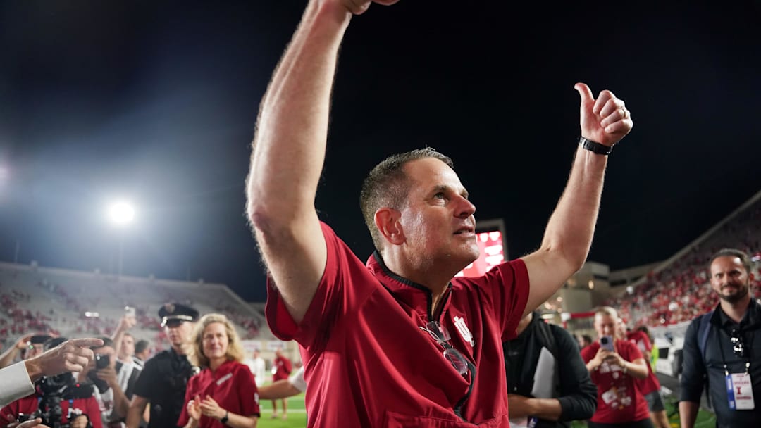 Sep 20, 2025; Bloomington, Indiana, USA; Indiana Hoosiers head coach Curt Cignetti celebrates after defeating the Illinois Fighting Illini at Memorial Stadium. Mandatory Credit: Robert Goddin-Imagn Images
