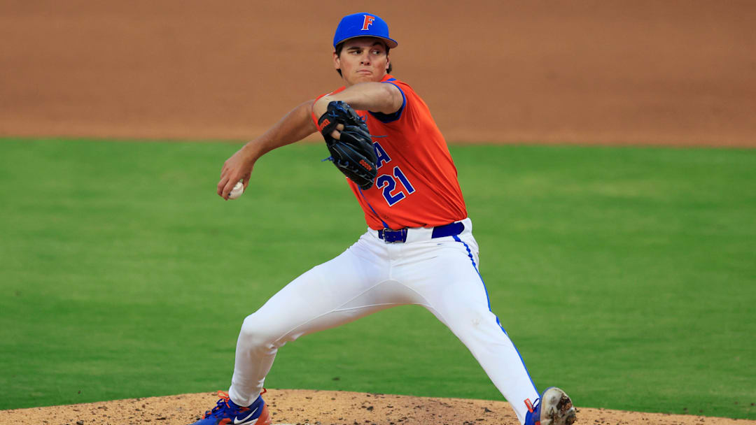 Florida utility Caden McDonald (21) pitches during the fifth inning of an NCAA college baseball matchup Tuesday, March 25, 2025 at VyStar Ballpark in Jacksonville, Fla. FSU rallied to defeat UF 8-4 off a walk-off grand slam from Alex Lodise in the ninth inning. [Corey Perrine/Florida Times-Union]