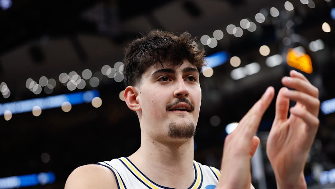 Mar 27, 2026; Chicago, IL, USA; Michigan Wolverines center Aday Mara (15) reacts after defeating the Alabama Crimson Tide in a Sweet Sixteen game of the Midwest Regional of the men's 2026 NCAA Tournament at United Center. Mandatory Credit: Kamil Krzaczynski-Imagn Images