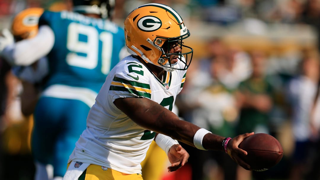 Green Bay Packers quarterback Malik Willis (2) hands off during the fourth quarter of an NFL football matchup Sunday, Oct. 27, 2024 at EverBank Stadium in Jacksonville, Fla. The Packers edged the Jaguars 30-27 on a last-second field goal. [Corey Perrine/Florida Times-Union]