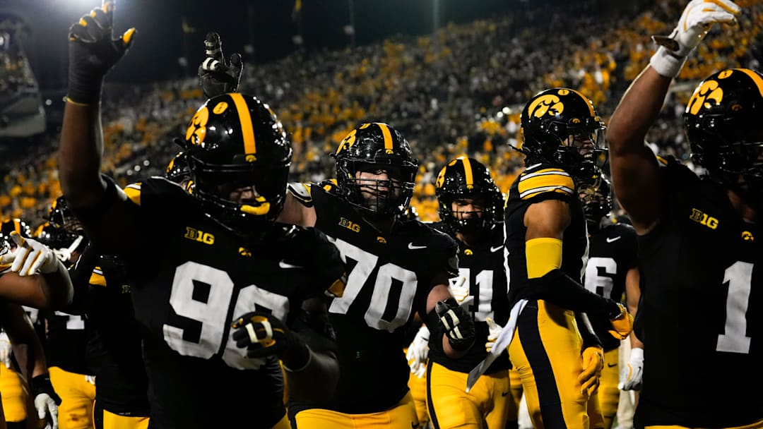 The Iowa Hawkeyes celebrate after defeating the Penn State Nittany Lions 25-24 Oct. 18, 2025 at Kinnick Stadium in Iowa City, Iowa.