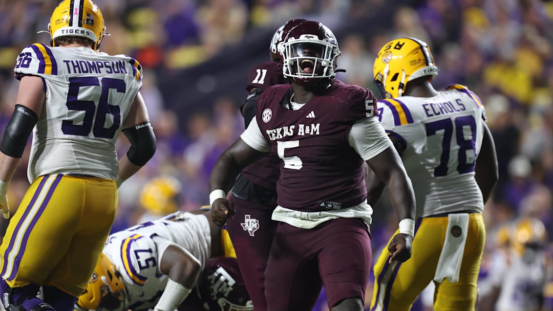 Oct 25, 2025; Baton Rouge, Louisiana, USA; Texas A&M Aggies defensive tackle DJ Hicks (5) celebrates after a play during the second half against the Louisiana State Tigers at Tiger Stadium. Mandatory Credit: Stephen Lew-Imagn Images Oct 25, 2025; Baton Rouge, Louisiana, USA; Texas A&M Aggies defensive tackle DJ Hicks (5) celebrates after a play during the second half against the Louisiana State Tigers at Tiger Stadium. Mandatory Credit: Stephen Lew-Imagn Images