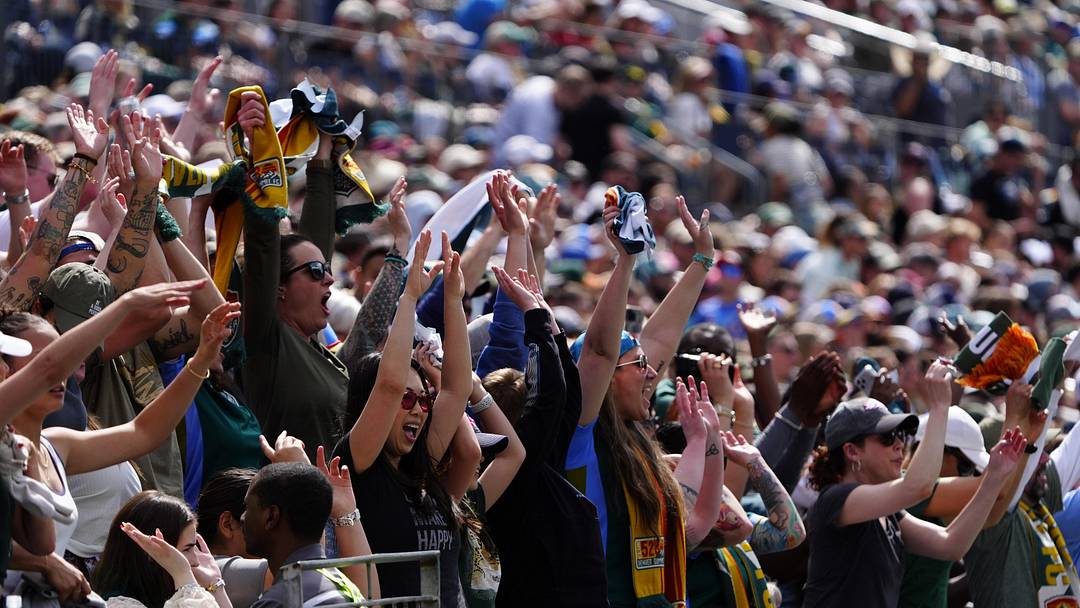 Mar 28, 2026; Denver, Colorado, USA; Denver Summit FC fans cheer during the match against the Washington Spirit at Empower Field at Mile High. Mandatory Credit: Ron Chenoy-Imagn Images