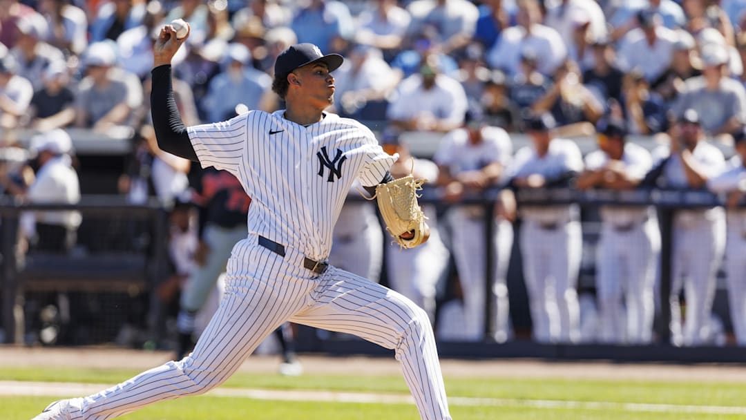 Feb 21, 2026; Tampa, Florida, USA; New York Yankees pitcher Carlos Lagrange (84) throws a pitch against the Detroit Tigers during the second inning in a Spring Training game at George M. Steinbrenner Field. Mandatory Credit: Morgan Tencza-Imagn Images