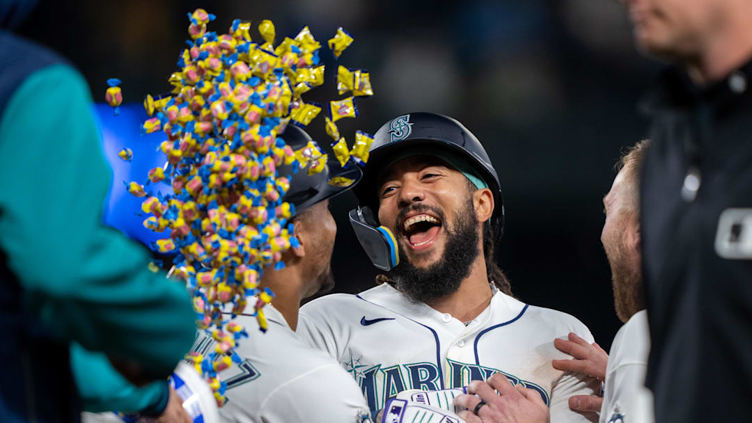 Apr 11, 2026; Seattle, Washington, USA; Seattle Mariners shortstop J.P. Crawford (3) celebrates with teammates after a game against the Houston Astros at T-Mobile Park. Mandatory Credit: Stephen Brashear-Imagn Images