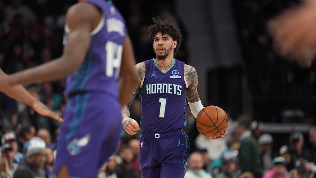 Jan 26, 2026; Charlotte, North Carolina, USA; Charlotte Hornets guard LaMelo Ball (1) brings the ball up court against the Philadelphia 76ers during the second half at Spectrum Center. Mandatory Credit: Jim Dedmon-Imagn Images