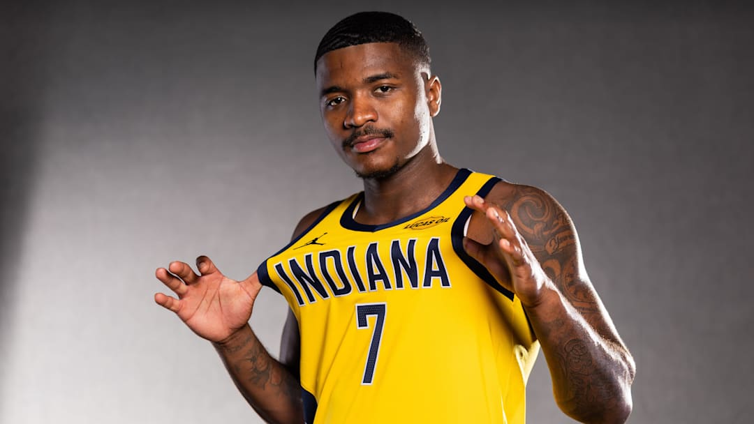 Sep 29, 2025; Indianapolis, IN, USA;  Indiana Pacers guard Kam Jones (7) poses for a photo during media day. Mandatory Credit: Trevor Ruszkowski-Imagn Images