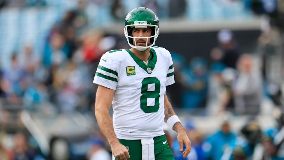 New York Jets quarterback Aaron Rodgers (8) looks on before an NFL football matchup Sunday, Dec. 15, 2024 at EverBank Stadium in Jacksonville, Fla. [Corey Perrine/Florida Times-Union]