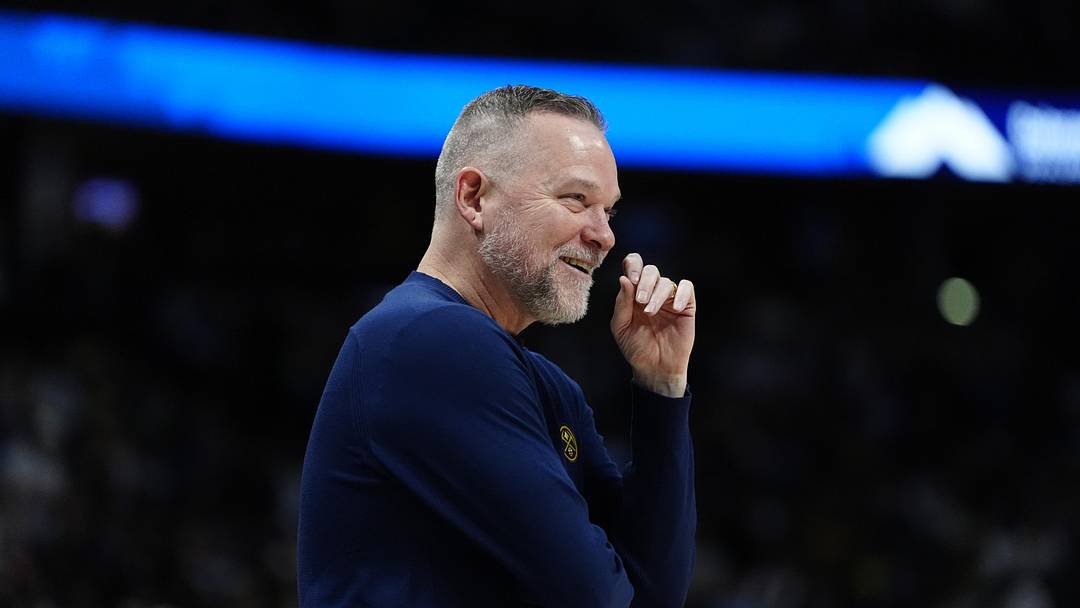 Mar 28, 2025; Denver, Colorado, USA; Denver Nuggets head coach Michael Malone  reacts in the second half against the Utah Jazz at Ball Arena. Mandatory Credit: Ron Chenoy-Imagn Images