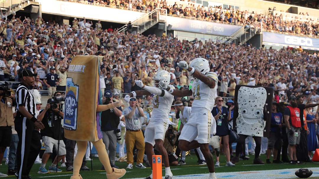 Dec 27, 2025; Orlando, FL, USA; Georgia Tech Yellow Jackets wide receiver Eric Rivers (3) celebrates after they scored a touchdown against the BYU Cougars during the second half at Camping World Stadium. Mandatory Credit: Kim Klement Neitzel-Imagn Images
