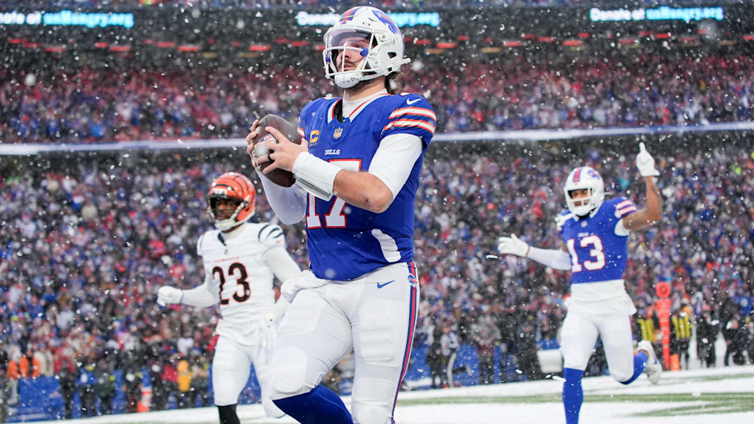 Dec 7, 2025; Orchard Park, New York, USA; Buffalo Bills quarterback Josh Allen (17) runs the ball for a touchdown in the fourth quarter against the Cincinnati Bengals at Highmark Stadium.