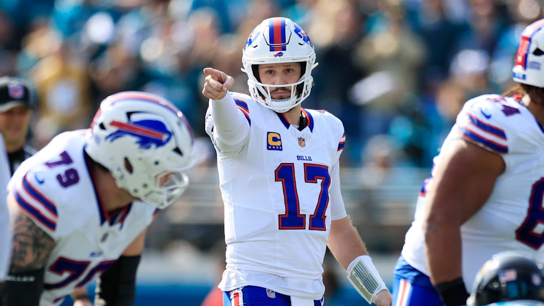 Buffalo Bills quarterback Josh Allen (17) calls a play during the first quarter of an NFL football AFC Wild Card playoff matchup, Sunday, Jan. 11, 2026, in Jacksonville, Fla. 