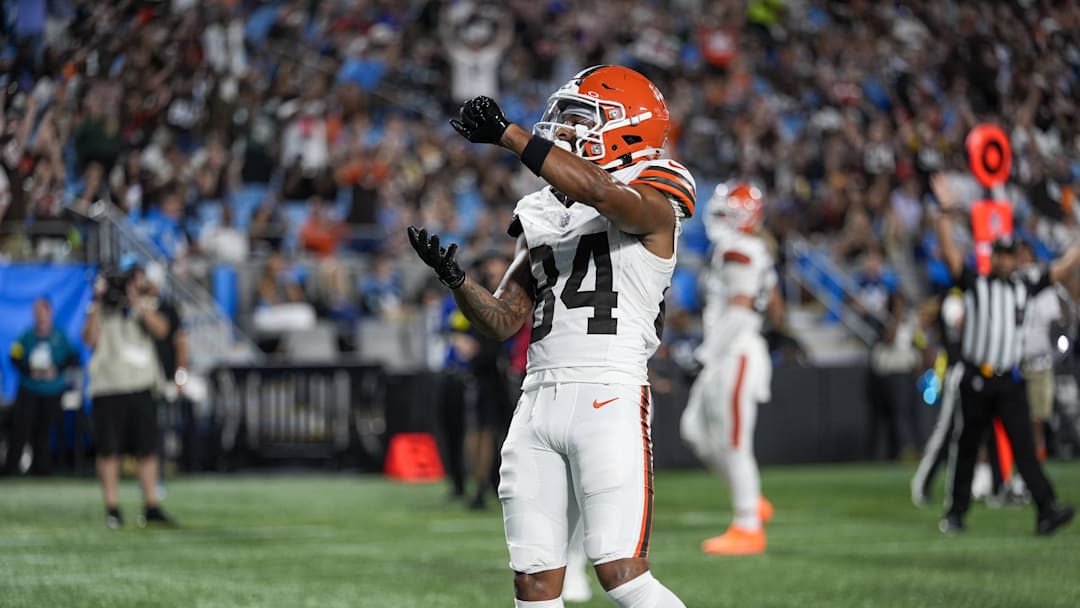 Aug 8, 2025; Charlotte, North Carolina, USA; Cleveland Browns wide receiver Gage Larvadain (84) celebrates his touchdown against the Carolina Panthers during the second half at Bank of America Stadium. Mandatory Credit: Jim Dedmon-Imagn Images