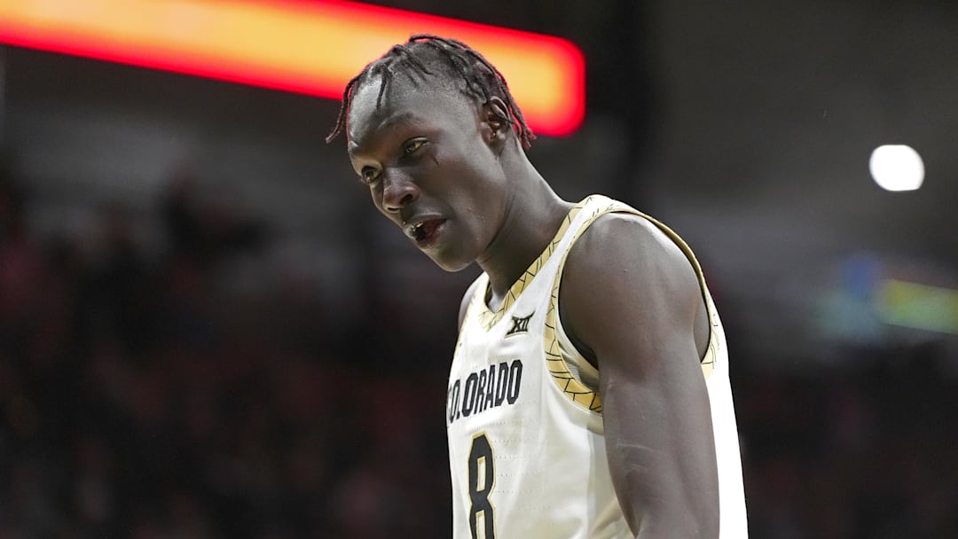 Jan 24, 2026; Boulder, Colorado, USA; Colorado Buffaloes forward Bangot Dak (8) reacts in the second half against the UCF Knights at the CU Events Center. Mandatory Credit: Ron Chenoy-Imagn Images