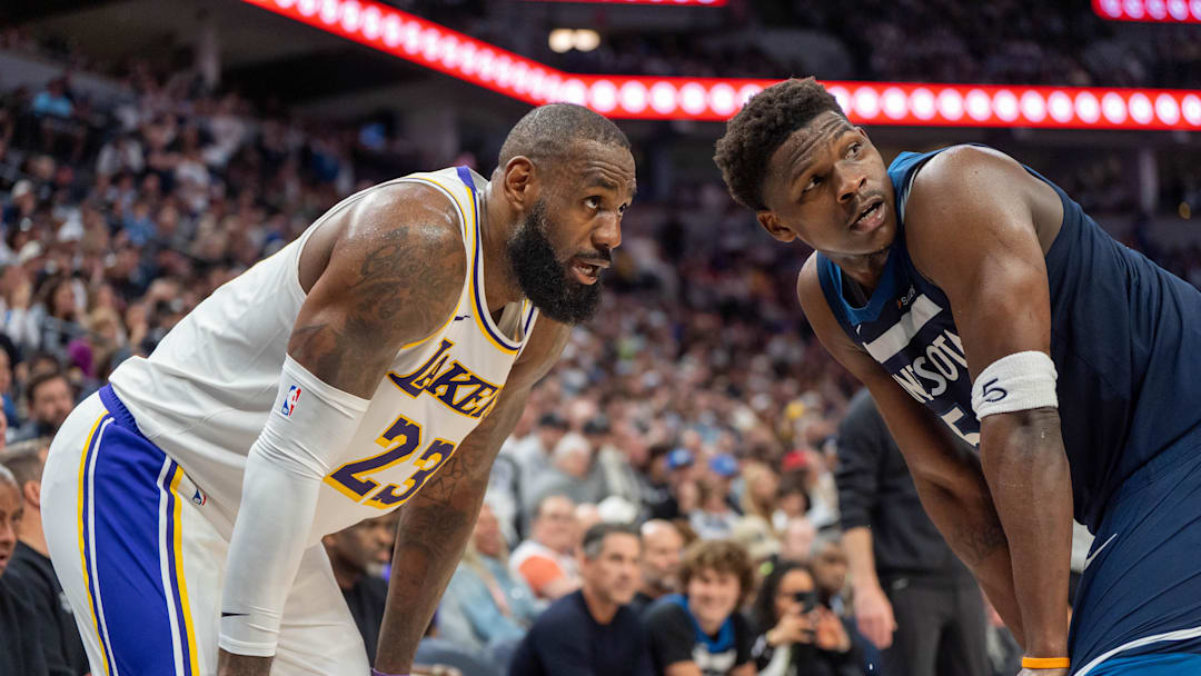  Minnesota Timberwolves guard Anthony Edwards (5) guards Los Angeles Lakers forward LeBron James (23) in the second quarter during game four of first round for the 2025 NBA Playoffs at Target Center. Mandatory Credit: Matt Blewett-Imagn Images