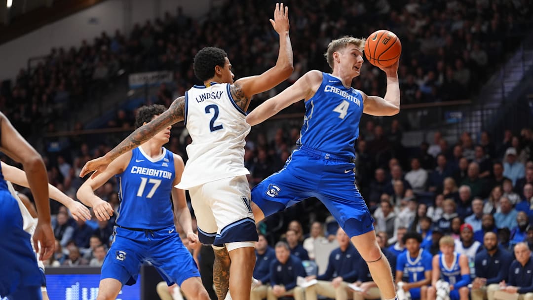 Creighton Bluejays guard Josh Dix (4) and Villanova Wildcats guard Bryce Lindsay (2) battle for the ball in the first half at William B. Finneran Pavilion.