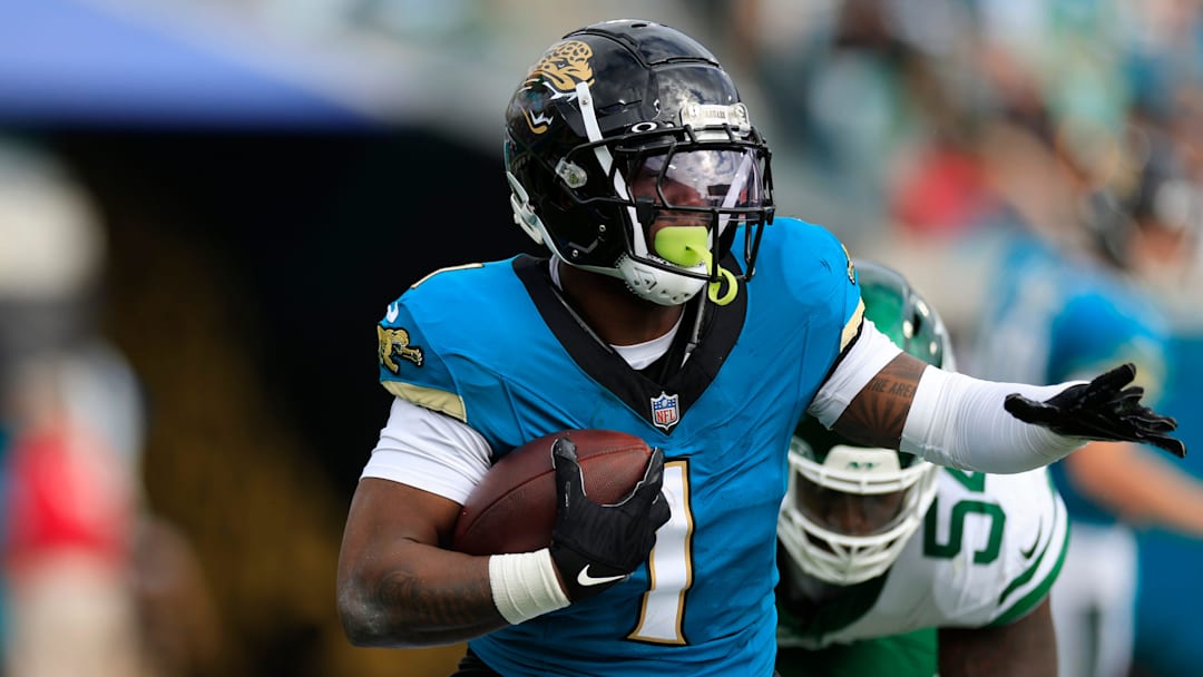 Jacksonville Jaguars running back Travis Etienne Jr. (1) rushes for yards during the second quarter Sunday, Dec. 15, 2024 at EverBank Stadium in Jacksonville, Fla.